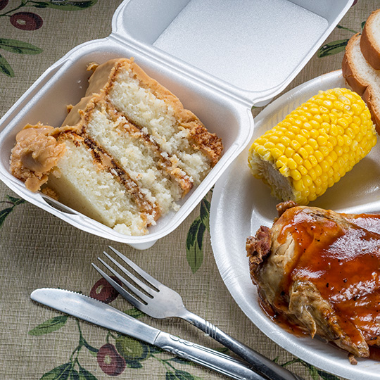 Plate of barbecue, sides and cake in Lincoln, Alabama.