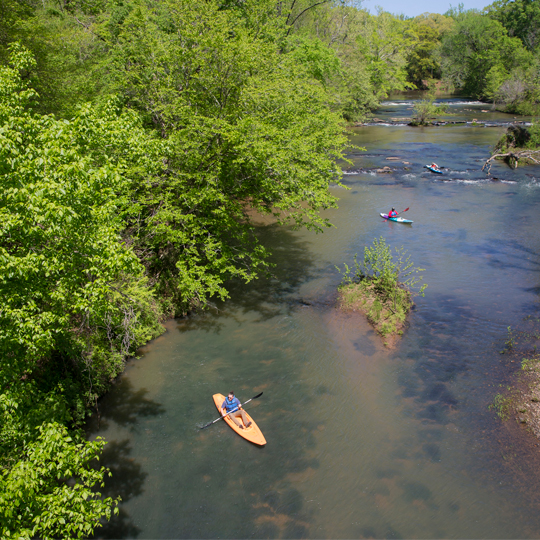 Kayakers in large body of water in Loachapoka, Alabama.